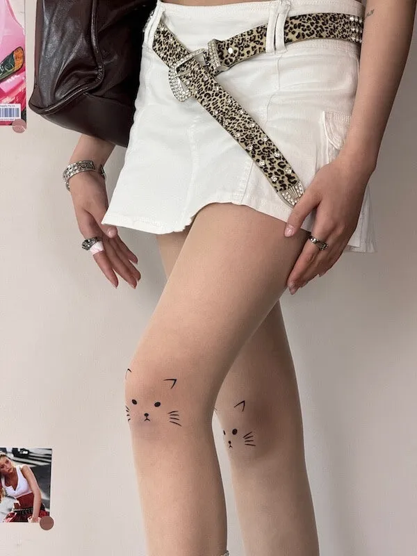 Kitty on knee tattoo tights